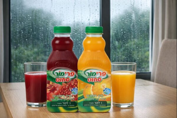 מיץ תפוזים ומיץ רימונים סחוט טבעי של פרימור לחורף צילום אראל סגרון